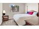 Bedroom with neutral walls, carpet, and window at 4050 Pacific Harbors Dr # 224, Las Vegas, NV 89121