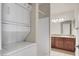 In-unit washer and dryer near bathroom at 4050 Pacific Harbors Dr # 224, Las Vegas, NV 89121