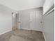 Bedroom featuring carpet flooring, neutral color palette, and closet doors at 4204 El Jardin Ave, Las Vegas, NV 89102
