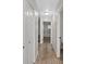 Hallway featuring hardwood floors with neutral color palette that offers a clean aesthetic at 4204 El Jardin Ave, Las Vegas, NV 89102