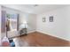 Bright bedroom with wood-look flooring and a cozy atmosphere at 4335 Twin Peaks Dr, North Las Vegas, NV 89032