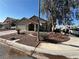 Charming single-Gathering home with a two-car garage and a well-manicured front yard at 4335 Twin Peaks Dr, North Las Vegas, NV 89032