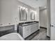 Bright bathroom featuring dual sinks, with stylish fixtures and a modern bathtub at 4525 Dean Martin Dr # 2903, Las Vegas, NV 89103
