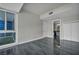 Bright bedroom featuring a large window, gray walls, and an ensuite bathroom at 4525 Dean Martin Dr # 2903, Las Vegas, NV 89103
