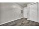 Neutral bedroom features tile flooring, a closet, and modern lighting at 4525 Dean Martin Dr # 2903, Las Vegas, NV 89103