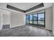 Bedroom with a large window and gray walls at 4525 Dean Martin Dr # 2903, Las Vegas, NV 89103