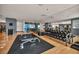 Weight training area featuring weight racks, benches, and mirrors in a well-equipped gym at 4525 Dean Martin Dr # 2903, Las Vegas, NV 89103