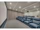 Modern theater room featuring tiered seating and a high-quality sound system for an immersive experience at 4525 Dean Martin Dr # 2903, Las Vegas, NV 89103