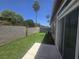 Backyard with block wall and artificial grass at 4764 Wild Draw Dr, North Las Vegas, NV 89031