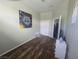 Bright bedroom with wood flooring, and ample closet space at 4764 Wild Draw Dr, North Las Vegas, NV 89031