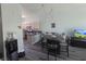Cozy dining area open to kitchen with modern appliances and a view of living area at 4764 Wild Draw Dr, North Las Vegas, NV 89031