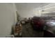 Attached garage with car, water heater, and storage space at 4764 Wild Draw Dr, North Las Vegas, NV 89031