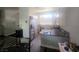 Well-equipped kitchen featuring stainless steel appliances, modern countertops, and ample natural light at 4764 Wild Draw Dr, North Las Vegas, NV 89031