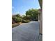 The backyard has a concrete patio, rock ground cover, and native landscaping at 5110 Silenzio St, Las Vegas, NV 89135