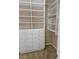 Walk-in closet with custom shelving and drawers, providing ample storage space at 5110 Silenzio St, Las Vegas, NV 89135