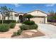 Charming single-story home boasts desert landscaping, a two-car garage, and a welcoming front entrance at 5110 Silenzio St, Las Vegas, NV 89135
