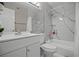 Bathroom featuring a white marble-style tiled shower and tub combination at 5375 Chestnut St, Las Vegas, NV 89119