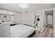 Bedroom featuring mirrored closet doors and ensuite bathroom at 5375 Chestnut St, Las Vegas, NV 89119
