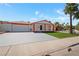 Charming single-story home featuring a well-maintained front yard and ample parking at 5375 Chestnut St, Las Vegas, NV 89119