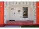 Inviting front porch with white columns and patterned brick accents at 5375 Chestnut St, Las Vegas, NV 89119