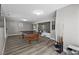 Spacious living room featuring a billiards table and modern design elements at 5375 Chestnut St, Las Vegas, NV 89119