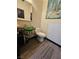 Unique powder room featuring an eclectic style sink, artistic decor, and tile flooring at 5419 Brass Hills Ct, Las Vegas, NV 89122