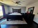 Bedroom with dark wood furniture including bed and dresser at 5419 Brass Hills Ct, Las Vegas, NV 89122