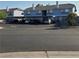 Multi-Gathering home exterior with covered parking and well-maintained landscaping at 5841 Medallion Dr # 102, Las Vegas, NV 89122