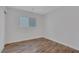 Bedroom with laminate floor and window at 589 Brinkburn Point Ave, Las Vegas, NV 89178