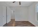 Bedroom with hardwood flooring, closet and window at 589 Brinkburn Point Ave, Las Vegas, NV 89178