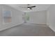 Spacious carpeted bedroom with natural light at 589 Brinkburn Point Ave, Las Vegas, NV 89178