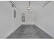 An empty two car garage, freshly painted, with concrete floor ready for your imagination at 589 Brinkburn Point Ave, Las Vegas, NV 89178