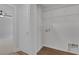 Laundry room with laminate flooring and white door at 589 Brinkburn Point Ave, Las Vegas, NV 89178