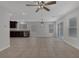 Open living space with tile floors and recessed lighting at 589 Brinkburn Point Ave, Las Vegas, NV 89178