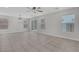 A bright and spacious living room area with modern ceiling fan at 589 Brinkburn Point Ave, Las Vegas, NV 89178