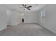 Large main bedroom featuring a ceiling fan and an ensuite bathroom at 589 Brinkburn Point Ave, Las Vegas, NV 89178