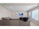Inviting living room features a cozy seating area, mounted TV, and ample natural light at 6056 Atlantis Dream Ave, Las Vegas, NV 89139