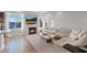 The living room features a fireplace and open windows that fill the home with light at 6056 Atlantis Dream Ave, Las Vegas, NV 89139