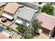 Aerial view shows backyard with mature trees, space for recreation and lush landscaping at 6133 Roseboro Ct, North Las Vegas, NV 89081