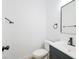 Bathroom with single vanity, white countertop and modern fixtures at 6133 Roseboro Ct, North Las Vegas, NV 89081