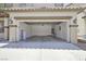 Spacious two-car garage with ample storage and lighting provides easy access to the home at 6133 Roseboro Ct, North Las Vegas, NV 89081