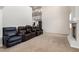 Spacious living area featuring plush theater seating and fireplace perfect for Gathering movie nights at 6351 Abacus Farms Ct, Las Vegas, NV 89131