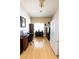 Home office boasts light wood floors, a functional desk setup, and ample storage with shelving and filing cabinets at 6493 Yellow Bells Ct, Las Vegas, NV 89131