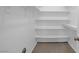 The closet is clean and well-organized, with several tiers of shelving along the back wall at 701 Capri Dr # 6A, Boulder City, NV 89005