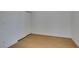 This bedroom features light, wood-look flooring and a closet with sliding doors at 7133 Tropical Island Cir, Las Vegas, NV 89129