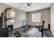 Home gym featuring exercise equipment, ample space, and natural light from the windows at 8531 W Oquendo Rd, Las Vegas, NV 89113