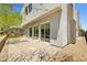 Private backyard with a low retaining wall and gravel accents at 865 Auroras Edge Ct, Henderson, NV 89012