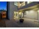 Outdoor living space boasting pavers, a fire pit, and access to the home's interior at 865 Auroras Edge Ct, Henderson, NV 89012