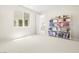 Neutral bedroom with a window and view into the bonus room at 865 Auroras Edge Ct, Henderson, NV 89012