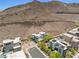 New construction community nestled against a mountain, offering modern living with scenic views at 865 Auroras Edge Ct, Henderson, NV 89012